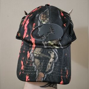 Paint Splattered Mossy Oak Camo Hat w/Spike Horns